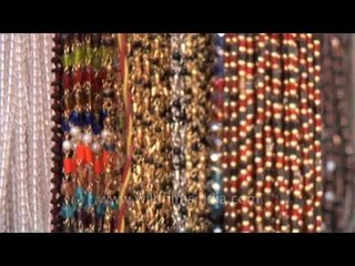 Скачать видео: Lord Shiva's holy Rudraksha Beads sales during Mahashivratri festival, Varanasi