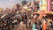 Devotees take a dip in the holy water of river Ganga on Shivratri, Varanasi