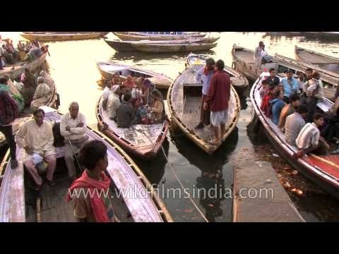 Devotees all set for a boat ride at the holy ganges of Varanasi ghats during Maha Shivratri