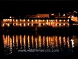 Lovely reflection of the night lit Taj Lake Palace in the waters, Udaipur