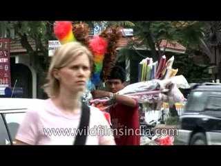 Plastic floor wiper seller on the streets of Kathmandu