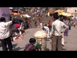 Varanasi Ganga Ghats flanked by roadside vendors during Maha Shivratri