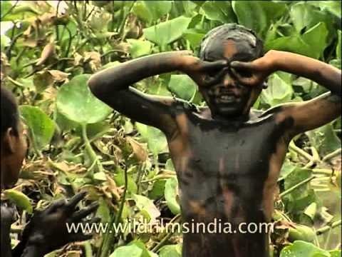 Mud & water wrestling kids at Yamuna River in Delhi