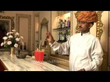 Bar-tender mixes a drink in Samode Palace, Rajasthan