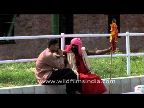 Nepali man talking with saint in Kathmandu