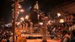 Evening Ganges aarti lamp held aloft, Varanasi