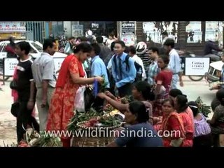 Lady shop for lychee in kathmandu, Nepal