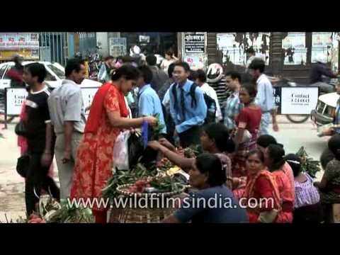 Lady shop for lychee in kathmandu, Nepal