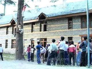 Students going through training of rope climbing