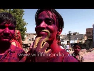 Women and kids enjoying 'Holi'