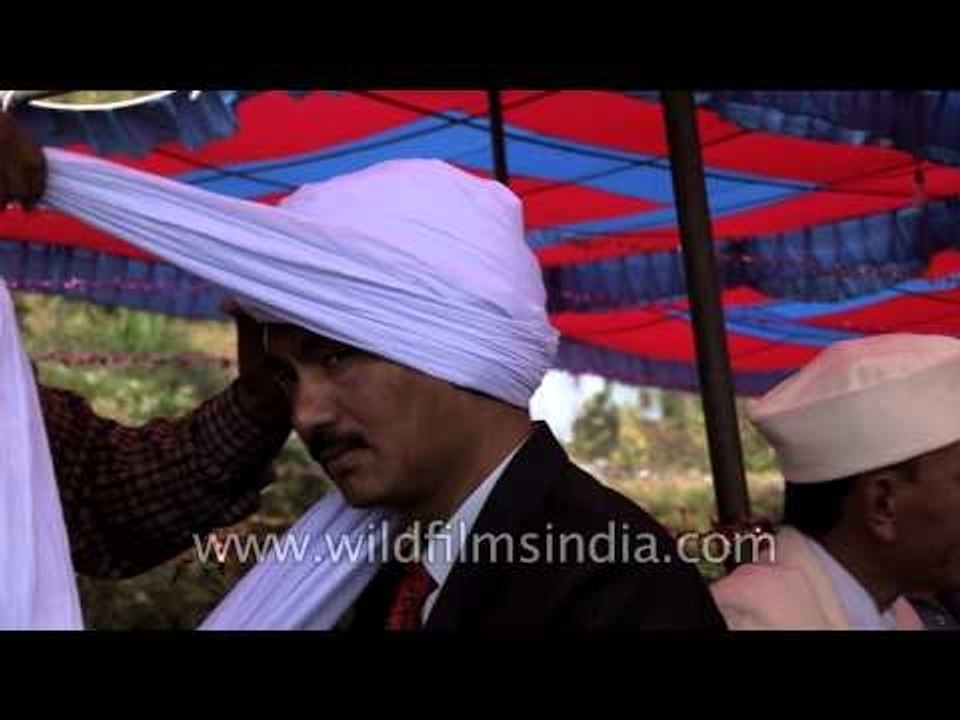 Women and men of rung community in traditional attire during Kangdali festival