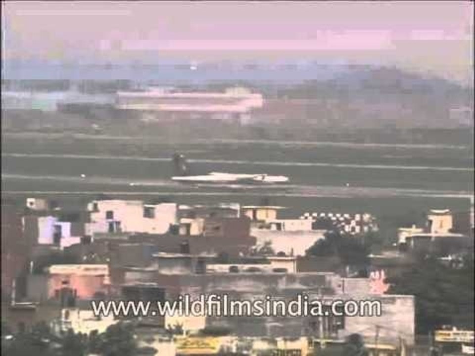 Airstrip and planes landing at Indira Gandhi International Airport