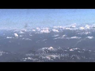 Snow Clad peaks of the Alps from an Airplane