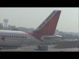 Air India plane on runway at Delhi airport