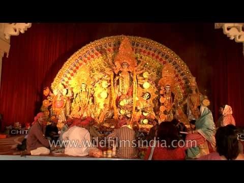 Devotees paying reverance to Maa Durga on Durga Puja