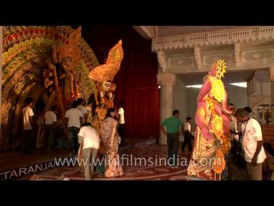 Devotees disassemble Durga pandal