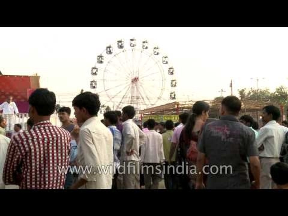 Dussehra carnival ride on Ferris Wheel to get a...