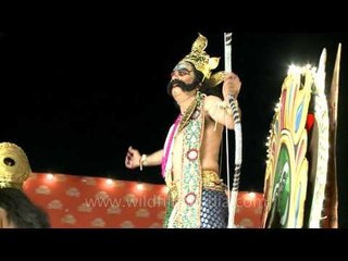Artist enacting demon king Ravana during Dussehra at Red Fort