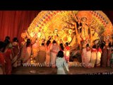 People offering 'Bel Patra' n taking blessings from God on Durga Puja