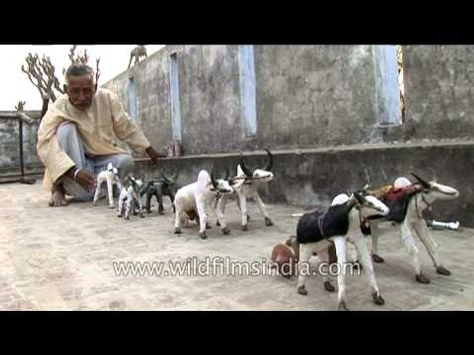 Villager making toy cattle in Uttar Pradesh
