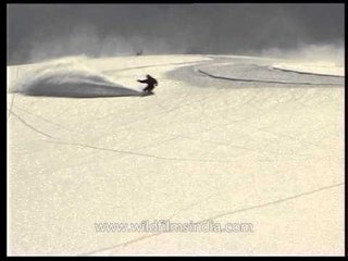 Snowboarding down the white snow flaked Himalayas!