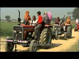 Villagers pimping ride on tractors in Uttar Pradesh