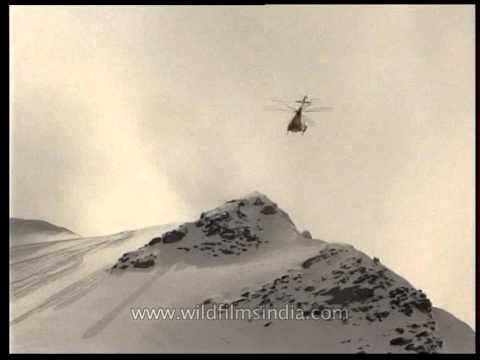 Chopper flying over the Himalayan mountain range