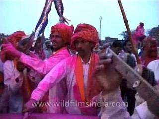 Celebrating holi with gaiety in song and dance, India