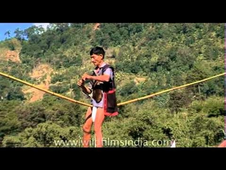 Ouch, balancing on the crotch! Arunachali man performing acrobatic gymnastics