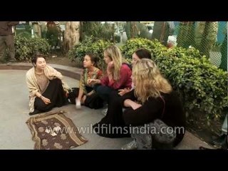 White women singing for alms on Delhi's streets!