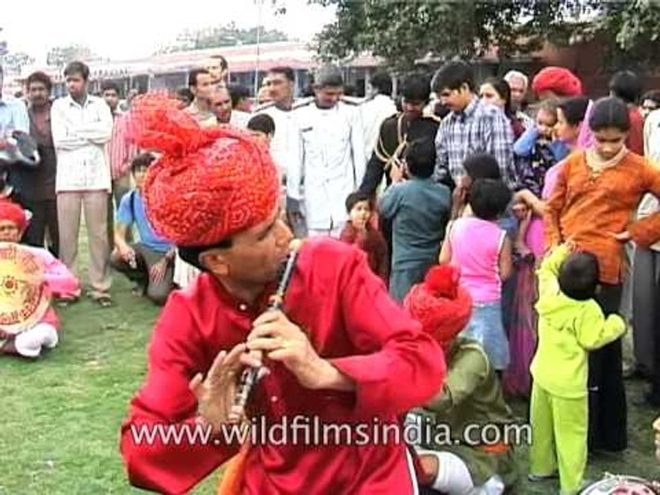 Folk musicians performing in open space at the...