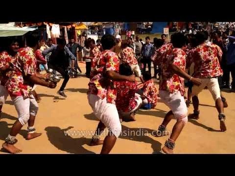 Artists performing a unique dance form at Surajkund Mela.