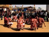 Visitors enjoying traditional dance forms at Surajkund Mela