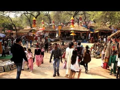 Stall of colorful statues at Surajkund Mela