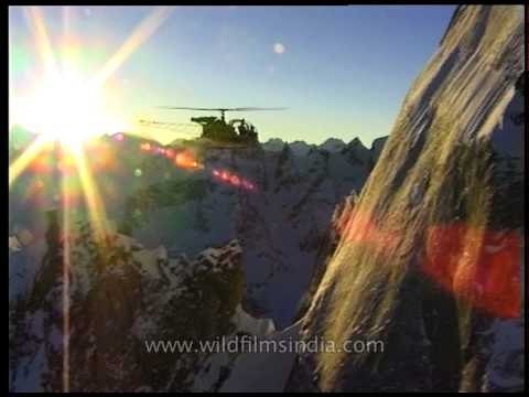 Aerial of chopper passing through Himalayan mountains