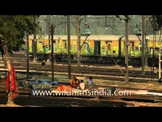 Dangerous lives - Homeless taking shelter at railway track, Nizamudin Railway Station