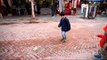 Children Playing with pull string toys at Dilli Haat