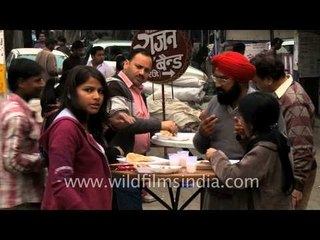 People enjoying delicious Kulchas at Kulcha King Amritsari Kulche Wale