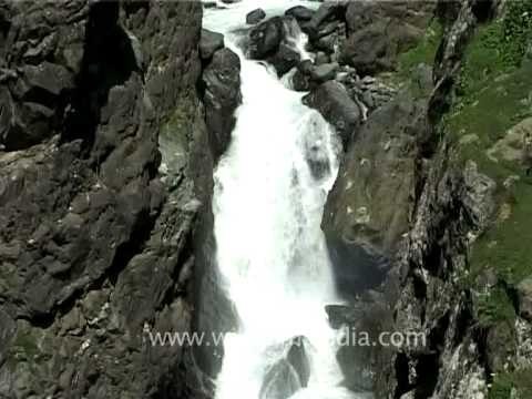 Waterfall gushing down the mountain in the Indian Himalayas, Jammu and Kashmir!