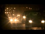 Delhi traffic brightly lit up with lights of cars