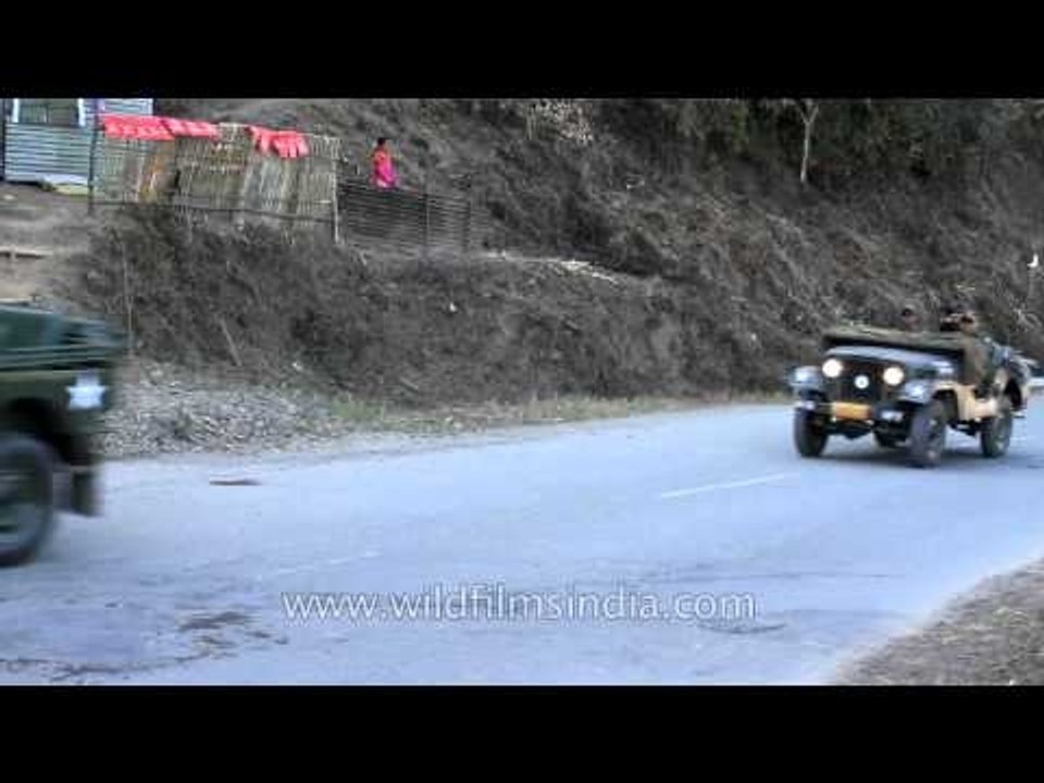 Indians dress up as American soldiers in WW2 attire and drive Willys jeeps