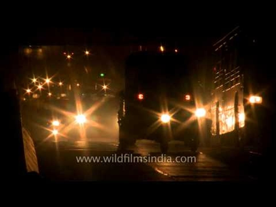 Rush hour traffic time lapse at night in Moolchand, Delhi