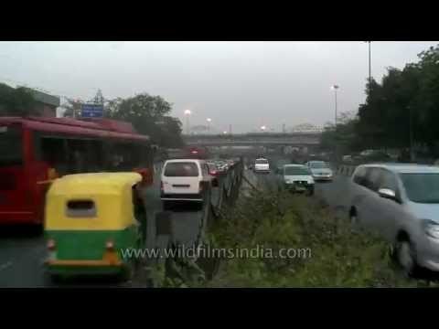 Time lapse of a busy intersection at downtown Moolchand - Night traffic, Delhi