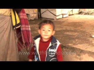 Cute Manipuri kid teasing mom at Senapati Bazaar, Manipur