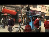School rickshaw outside Zeenat Mahal's haveli, Chandni Chowk