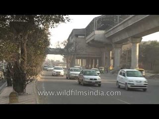 Traffic below elevated Jasola Apollo metro station, Delhi