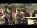 Push cart vendors selling food at Govindpuri metro station, Delhi
