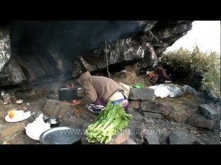 Camping in a rock cave at Dzukou valley