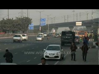 Traffic buzz under the Airport Metro Express line