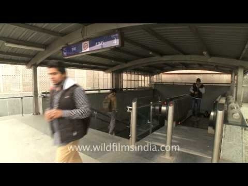 Commuters come out through gate no. 4 of the AIIMS metro station